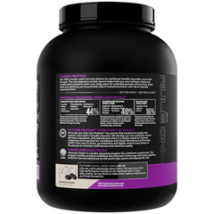 Rule 1 Proteins Casein shake poured into glass with cookies & creme flavor
