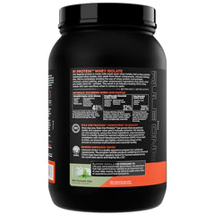 Rule 1 R1 Whey Isolate shake glass with creamy mint chocolate chip shake