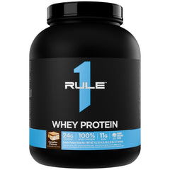 Rule 1 Whey Protein bottle with premium labeling for post-workout recovery.