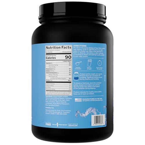 Rule 1 Clear Whey Isolate glass pouring blue raspberry for a light, hydrating protein drink.