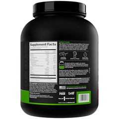 Rule1 Mass Gainer powder close-up highlights 1,220+ calories per serving
