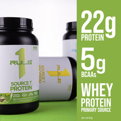 Rule 1 Source 7 protein scoop beside powder emphasizes convenience.