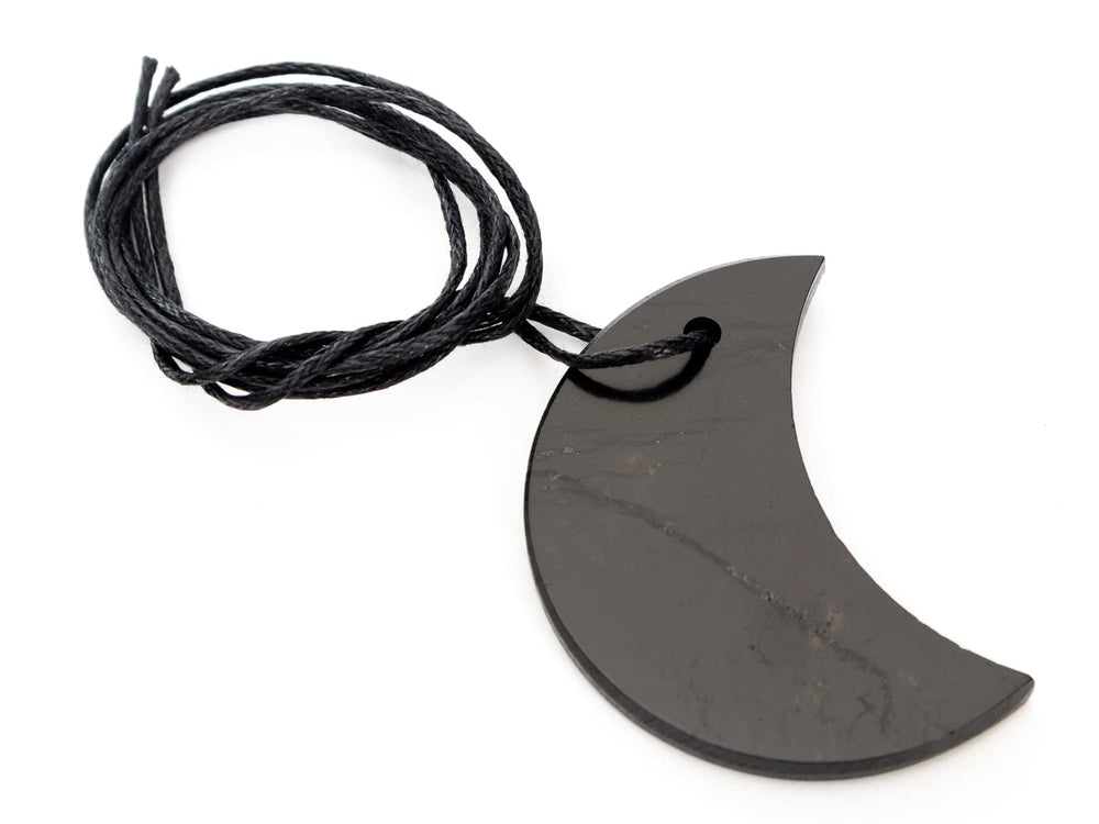 RUMINERAL Shungite pendant half-moon with cotton cord for everyday energy.