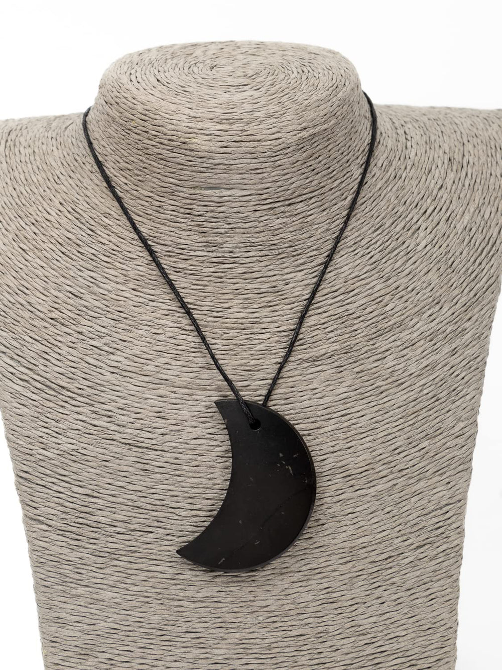 RUMINERAL Shungite pendant half-moon highlights authentic Karelia carbon structure.