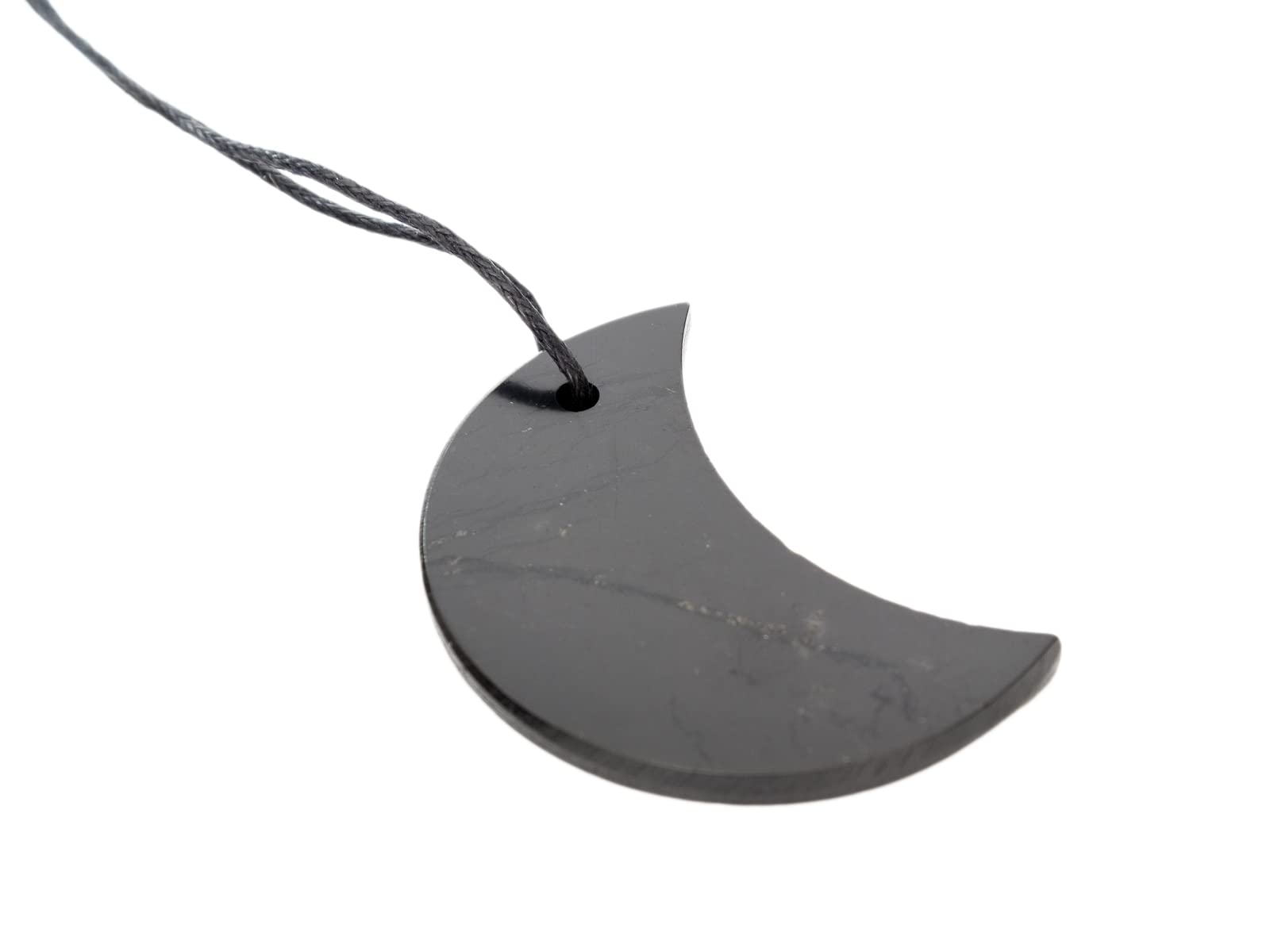 RUMINERAL two-inch Shungite pendant on cotton cord for versatile wear.