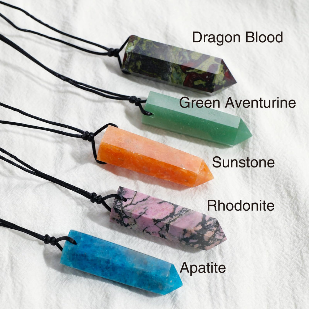Runyangshi Blue Apatite pendant on hand demonstrates wearable energy for daily rituals.