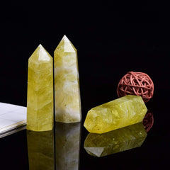 Runyangshi Citrine wand in meditation space aids focus and harmony.