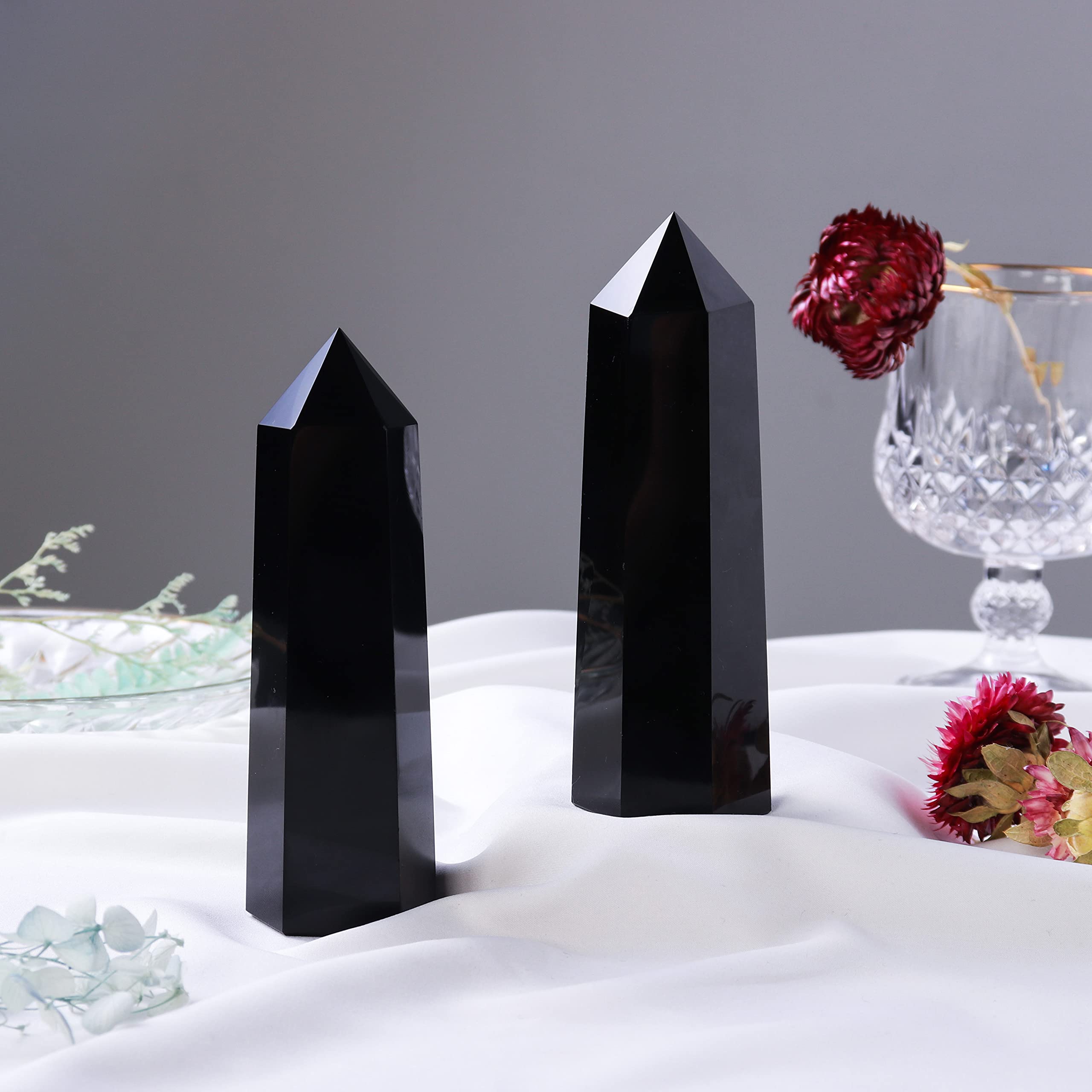 Runyangshi obsidian wand handheld size for easy grip during meditation.