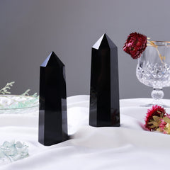 Runyangshi obsidian wand handheld size for easy grip during meditation.