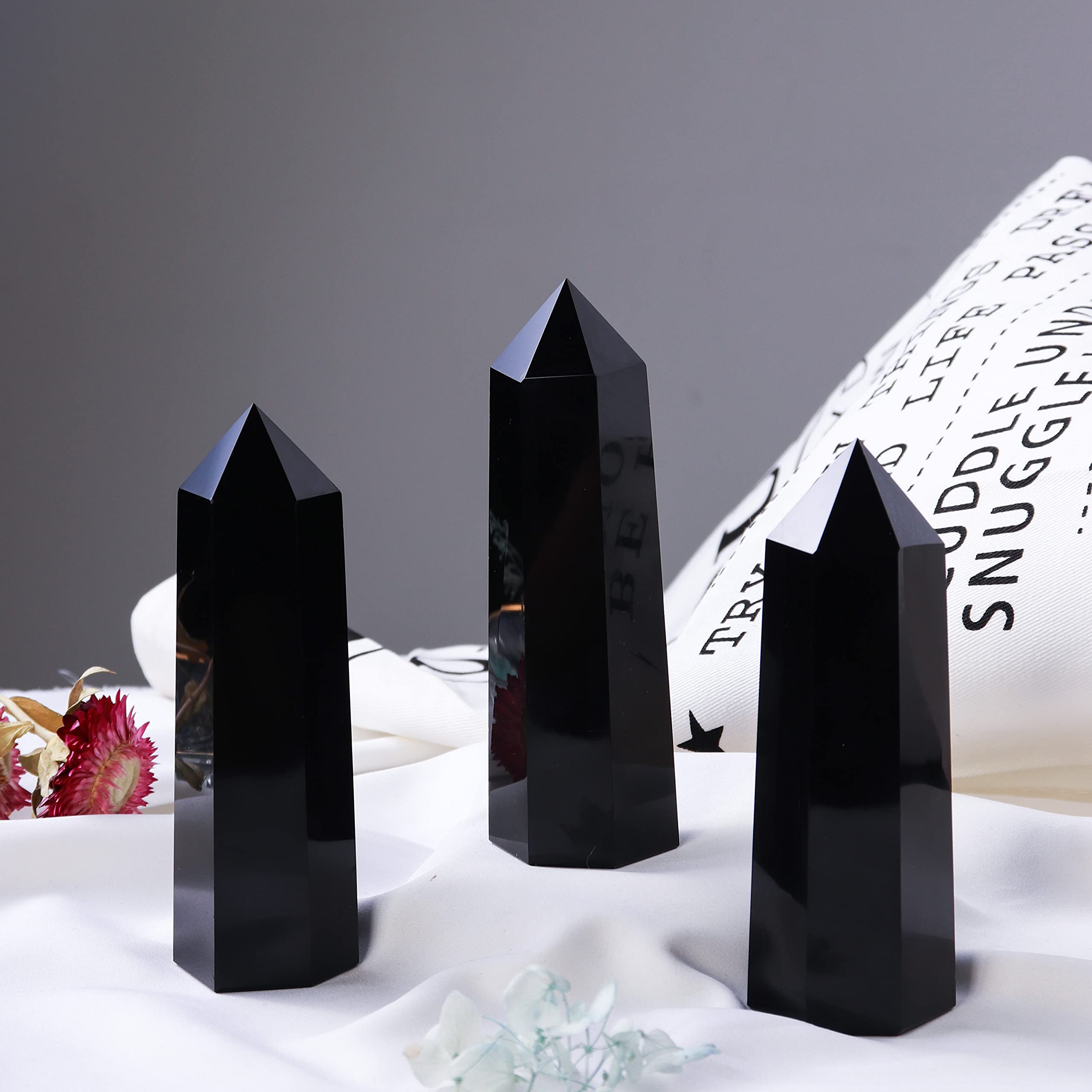 Runyangshi obsidian wand for Reiki or energy healing sessions.