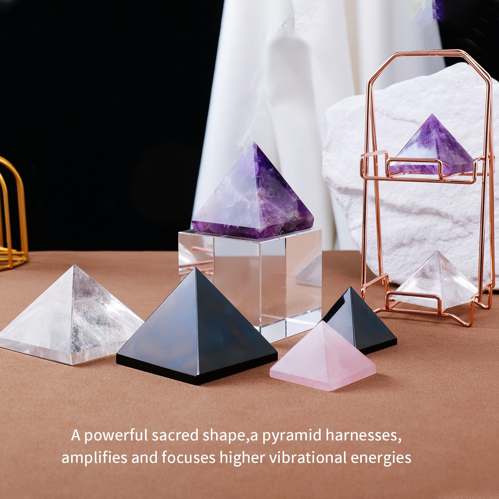 Runyangshi rose quartz pyramid surface shows color variation and natural beauty.