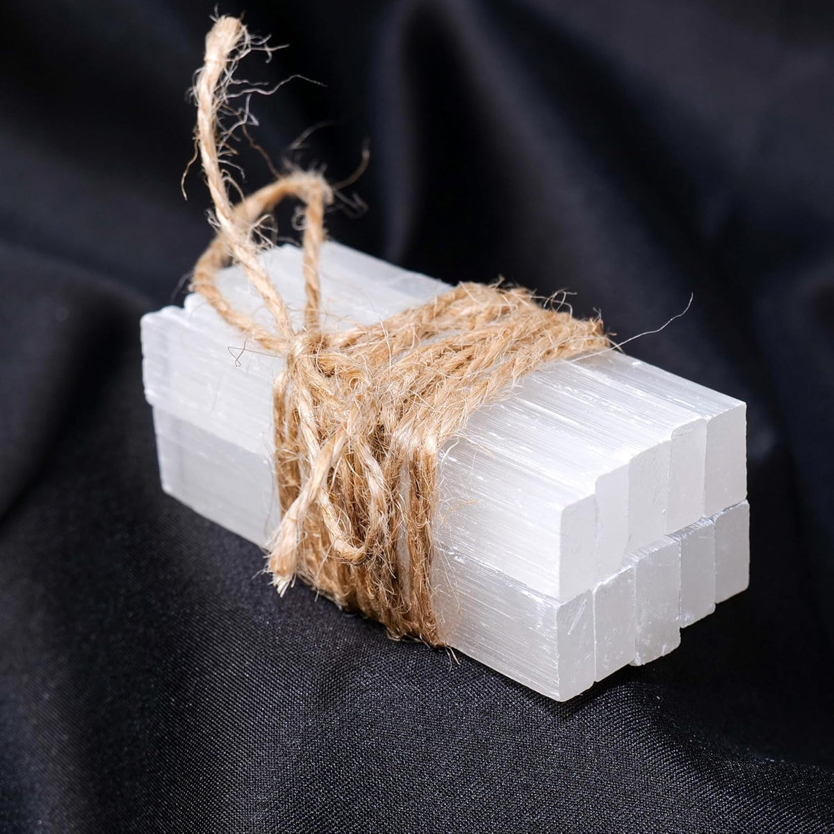 Runyangshi selenite sticks collection—natural translucence for cleansing spaces.