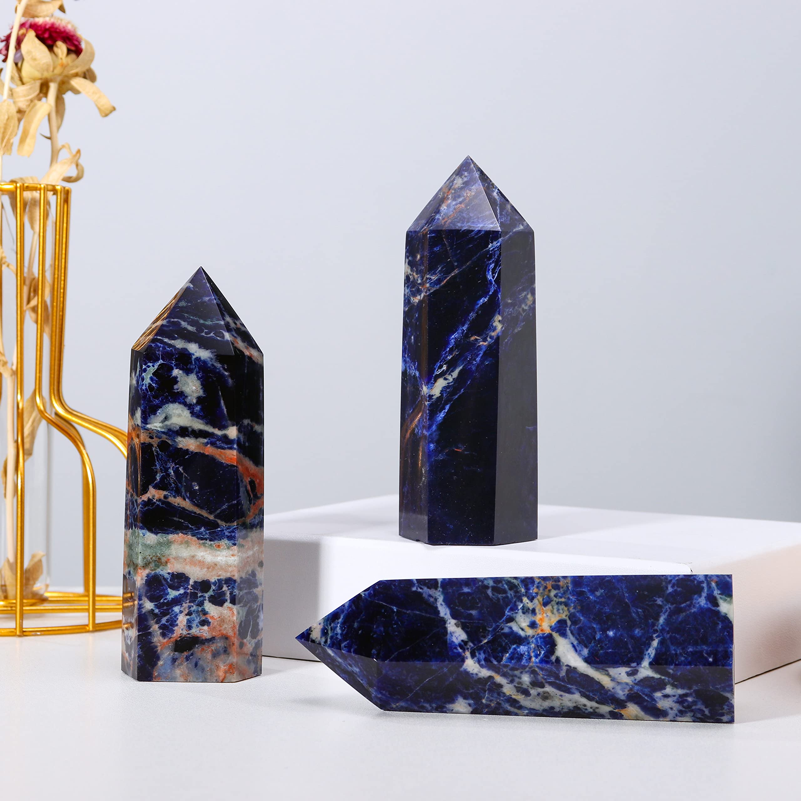 Runyangshi sodalite wand shimmering in ambient light invites focus