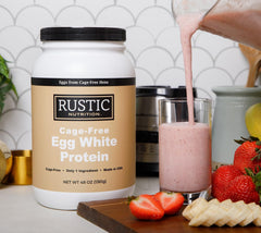Rustic Nutrition egg white protein powder scoop for precise serving in shakes.