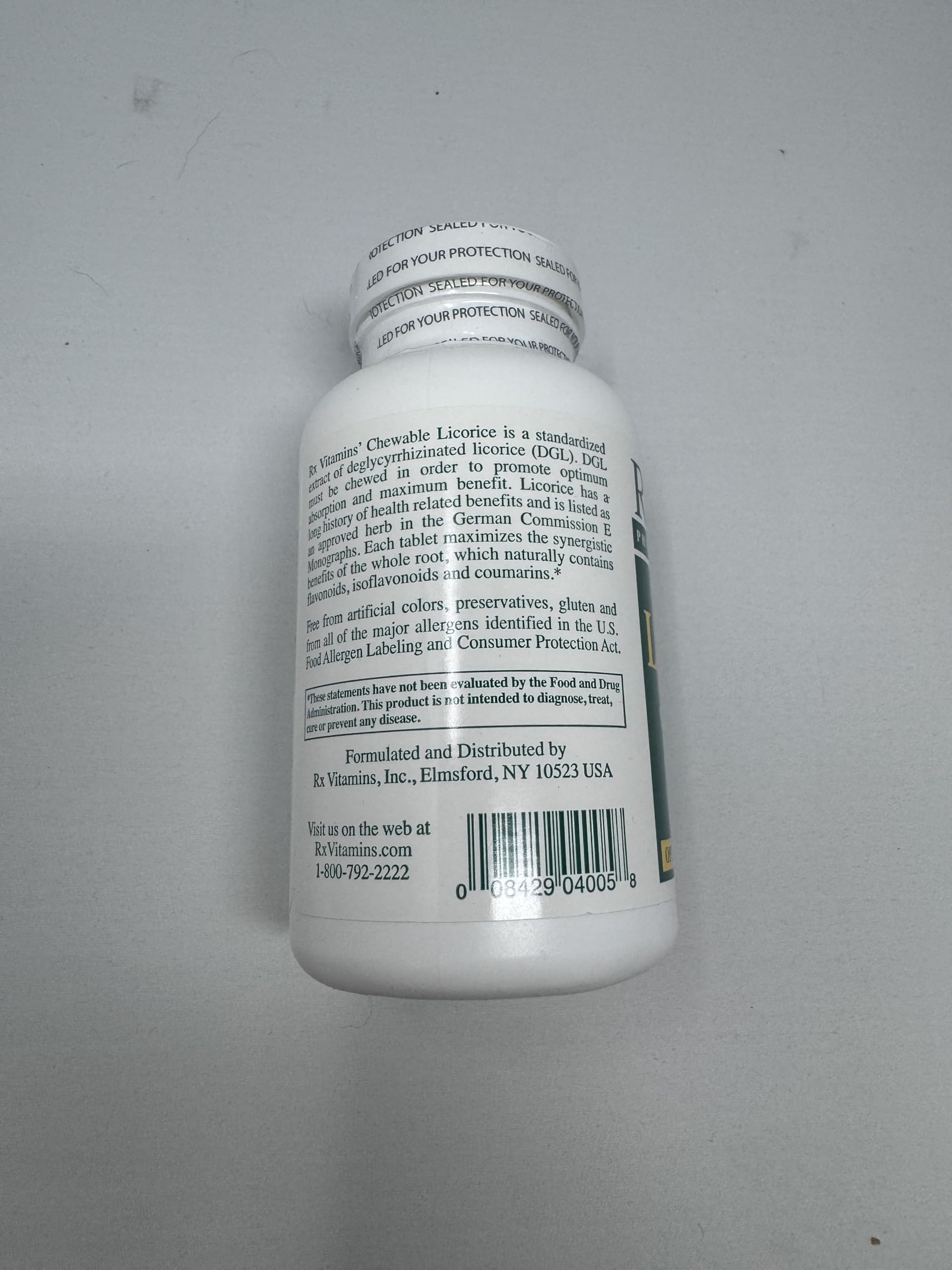Rx Vitamins DGL Licorice 500 mg tablet close-up showing chewable design for meals
