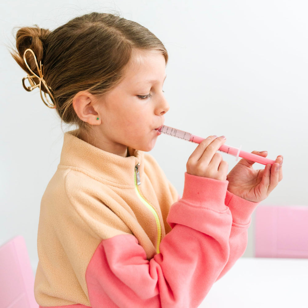 Family-friendly Cutie Dose design for caregivers and kids