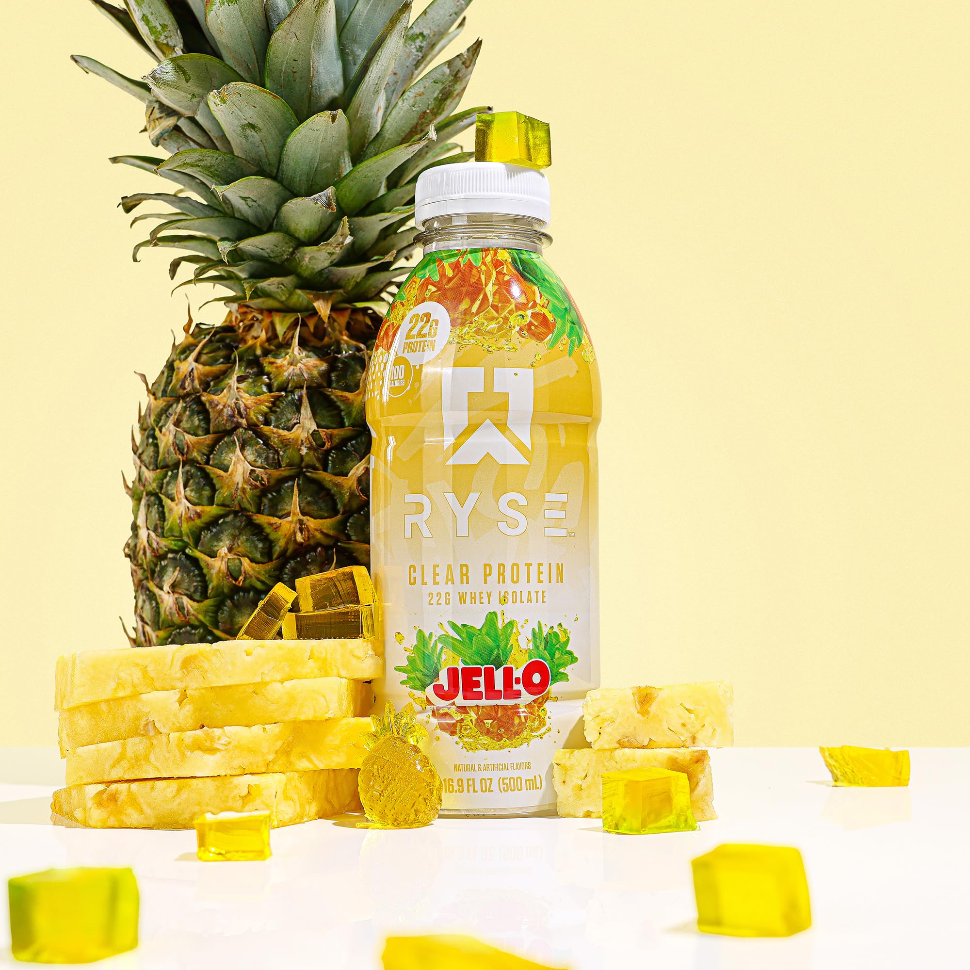 RYSE Clear Protein Drink pineapple splash bottle with ice conveys refreshing flavor