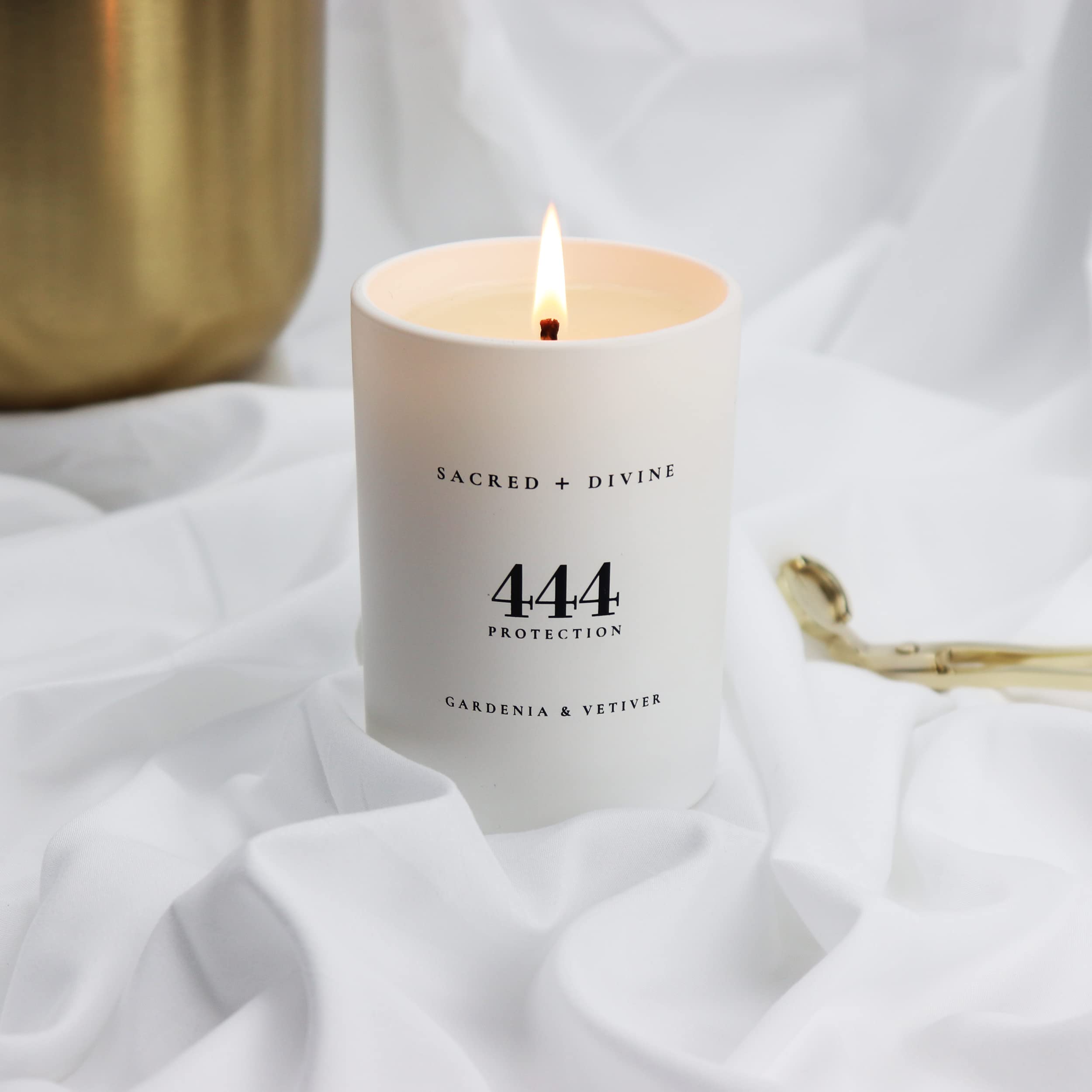 Sacred + Divine 444 black gift box candle ready for gifting positive energy.