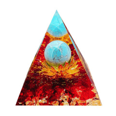 Saefheled Flower of Life orgonite pyramid front view with red glaze and turquoise finish, ideal for meditation