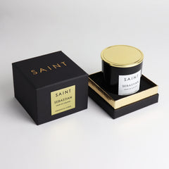 Gift-ready SAINT Sebastian candle packaging highlighting a 50-hour burn time.