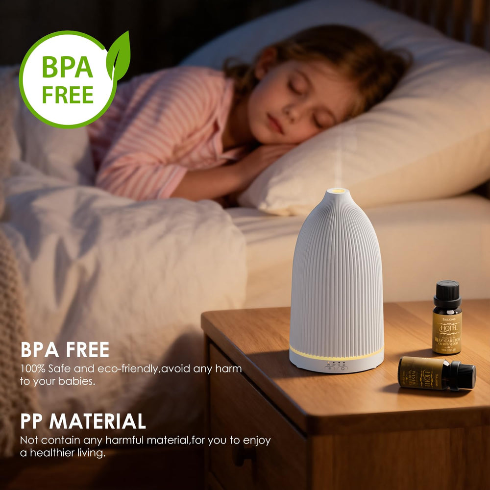 SALKING black diffuser shows intermittent mist for gentle relaxation.