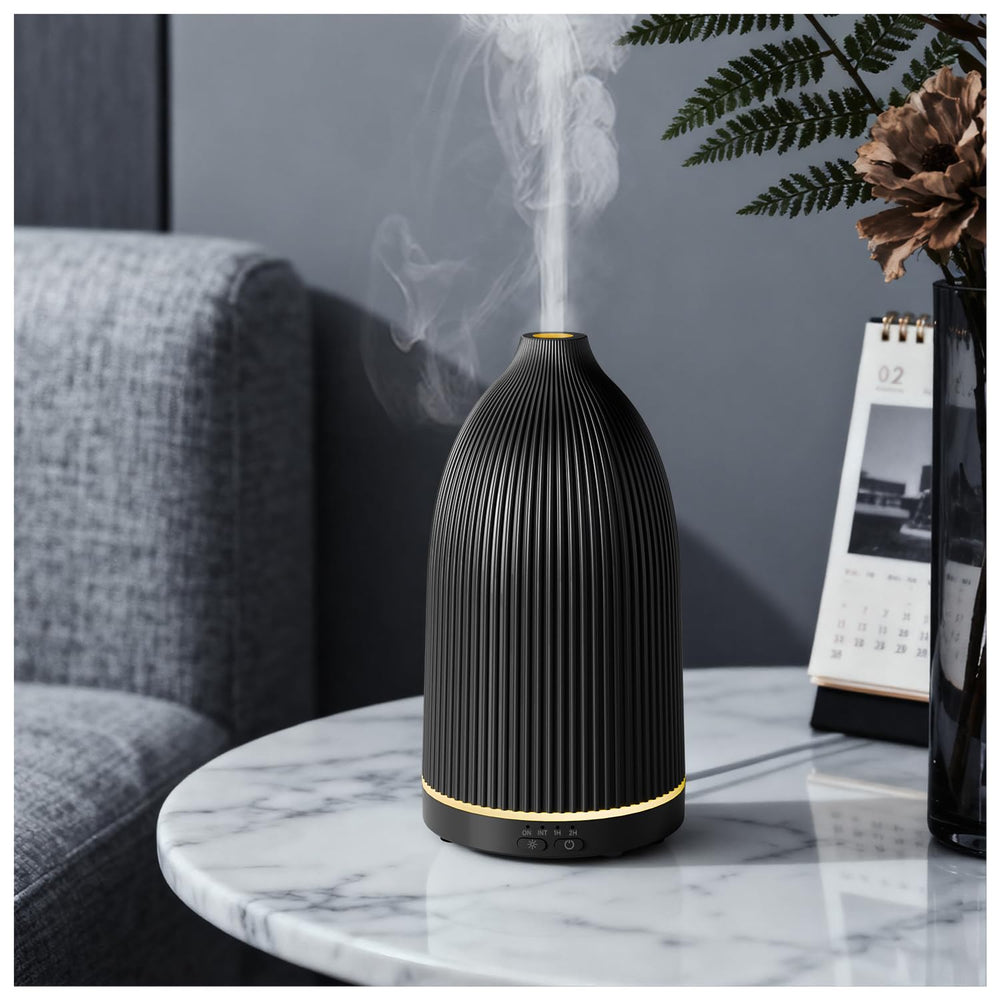 SALKING essential oil diffuser front view showing compact 100 ml capacity for aromatherapy in a small space
