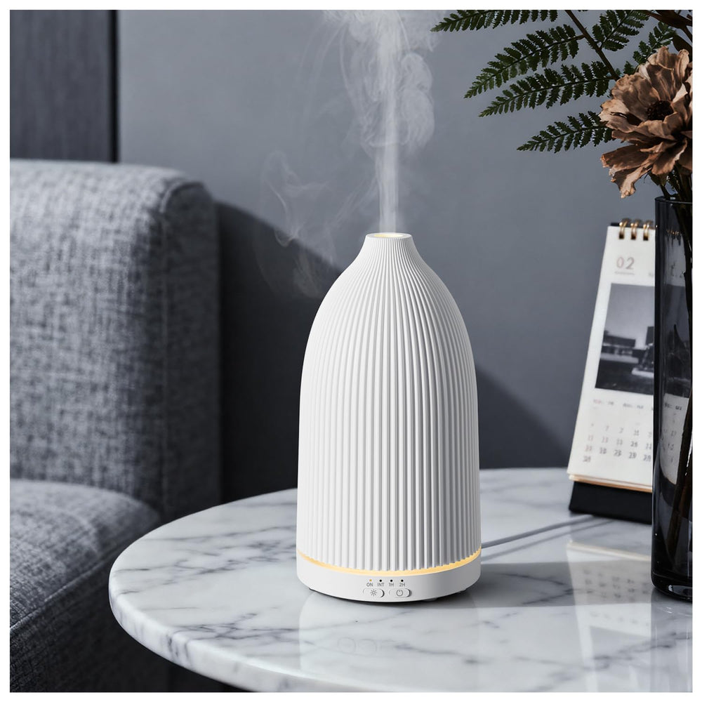 SALKING Essential Oil Diffuser white base, compact and quiet for bedside use.