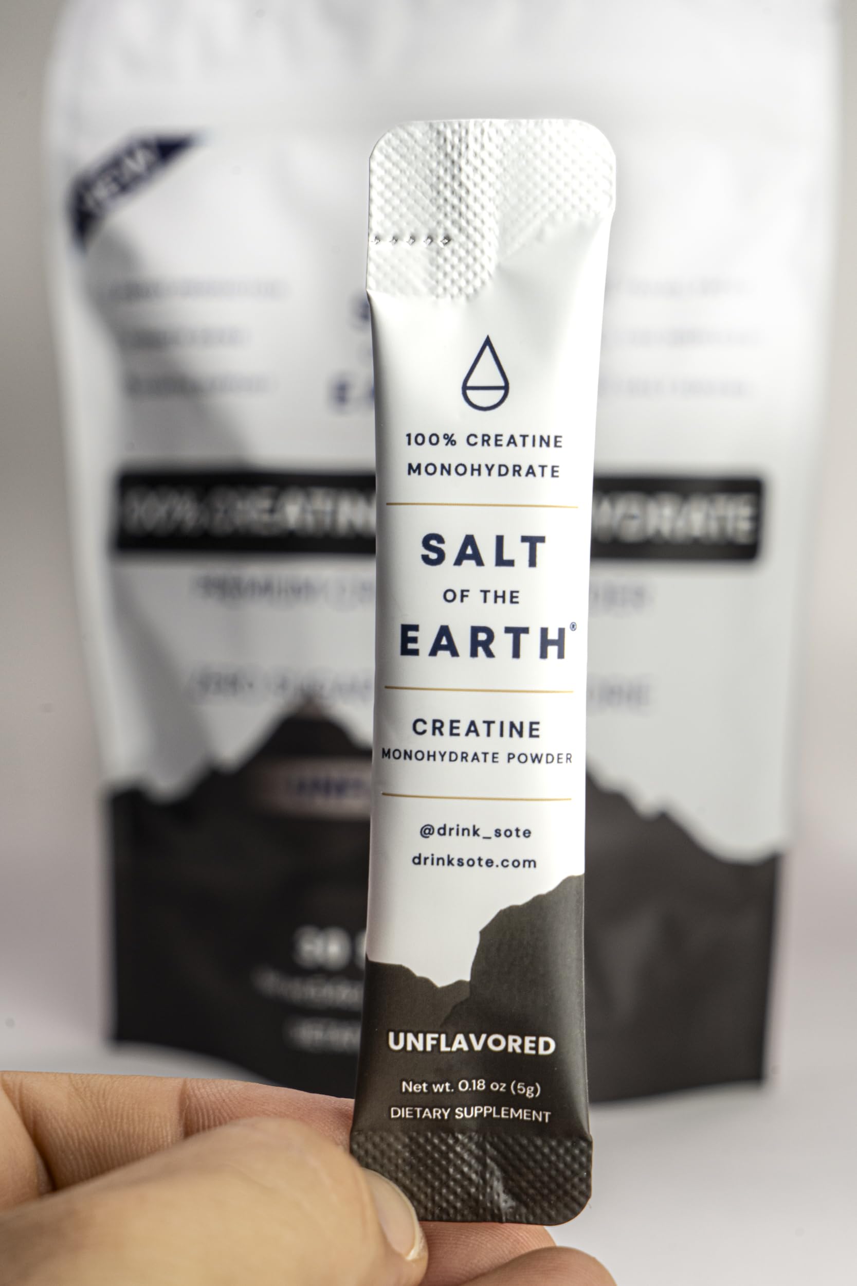 Salt of the Earth Creatine serving scoop in use during training.