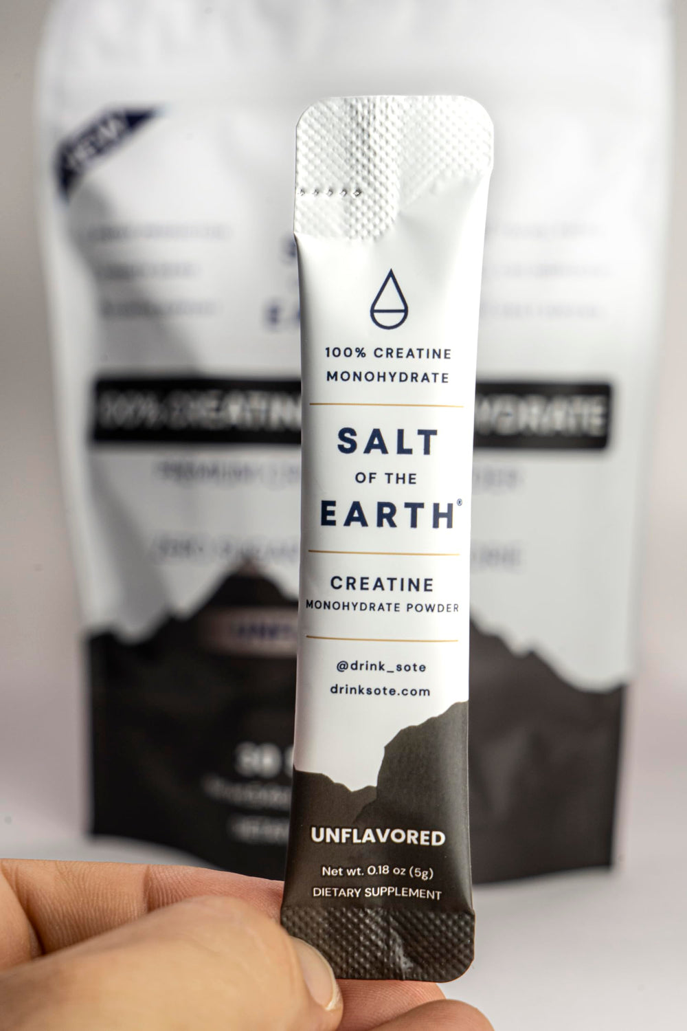 Salt of the Earth Creatine serving scoop in use during training.