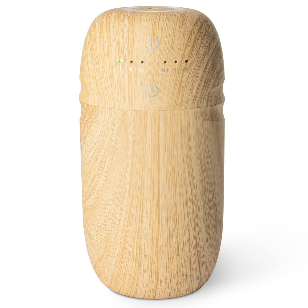 Salubrito waterless diffuser with wood-grain base enhances a warm ambiance.