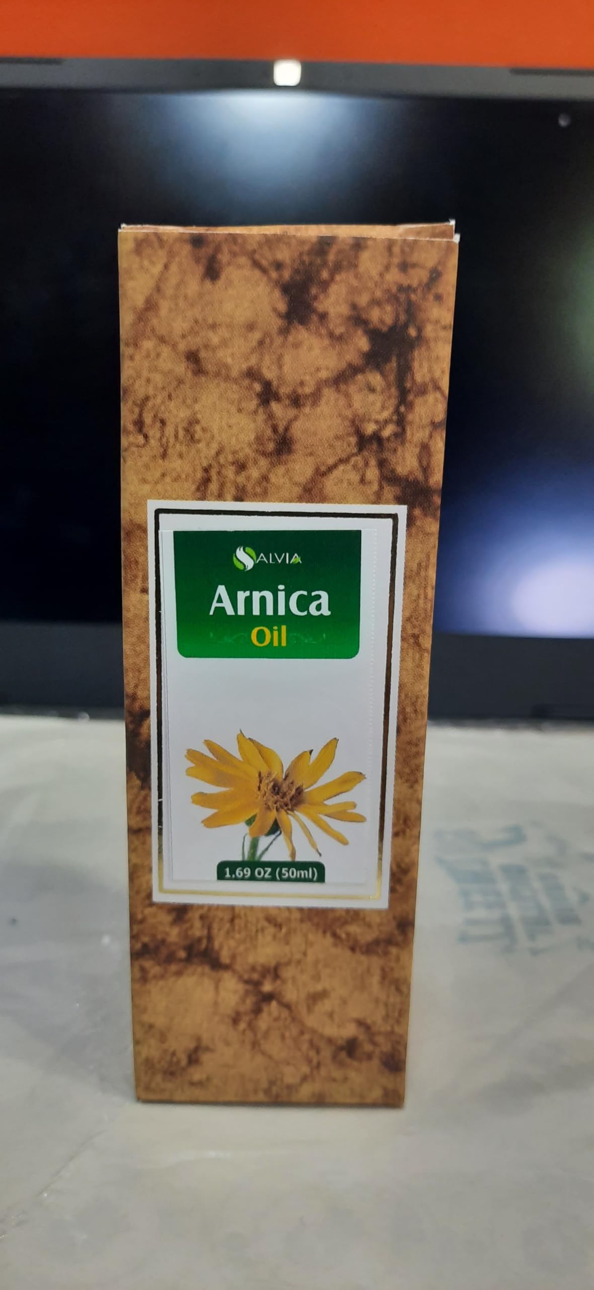 Salvia Arnica amber glass bottle highlighting premium packaging.