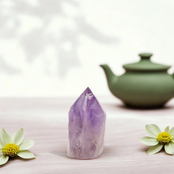 Samsari amethyst point on an altar adding tranquil ambiance.