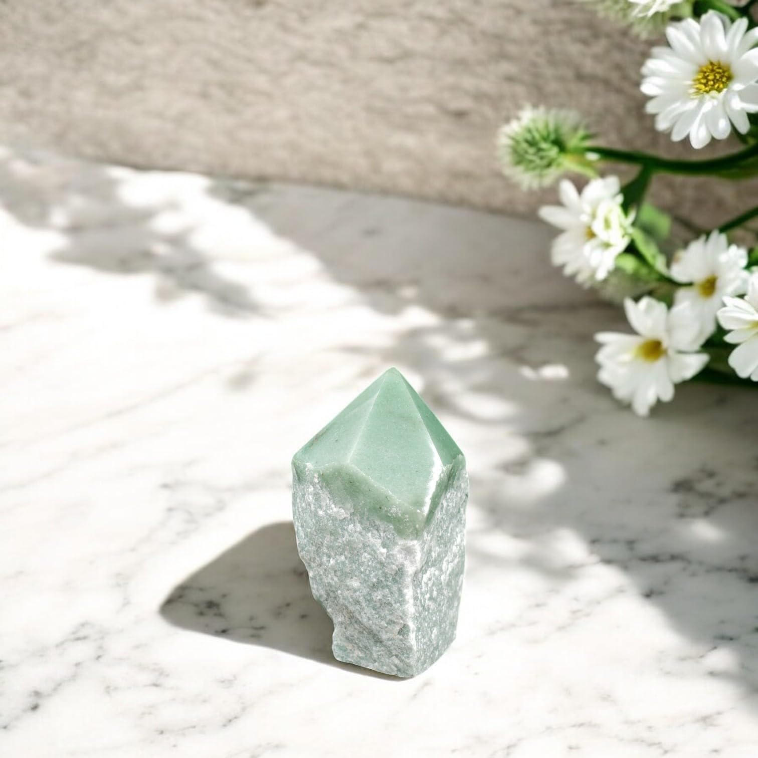 SAMSARI green quartz points elevate energy and decor in living spaces