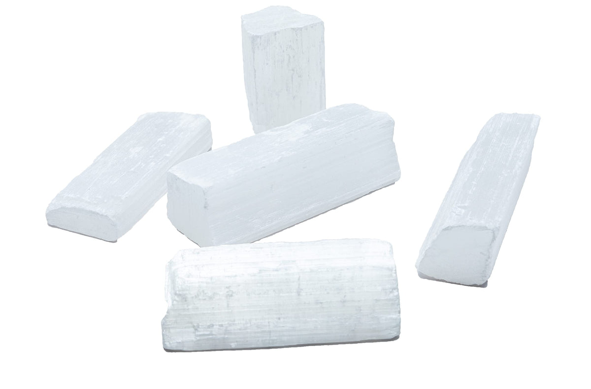 SAMSARI selenite stones raw closeup for calm energy and crystal healing inspiration.