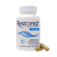 Close-up of Savant Science RestoreZ capsules with plant-based formula.