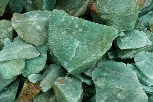 Sawcart Green Aventurine rough stone displayed for feng shui balance.