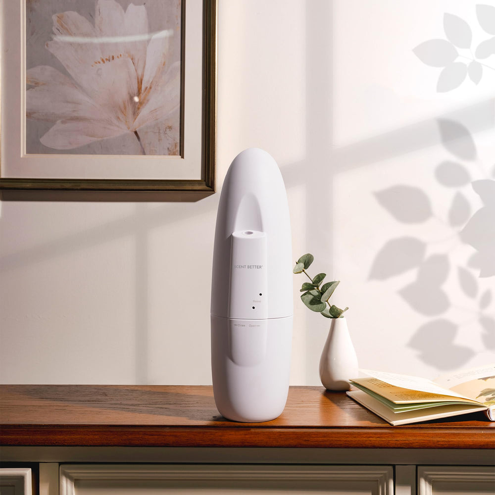 SB Scent Better Diffuser in white and black finishes enhances decor.