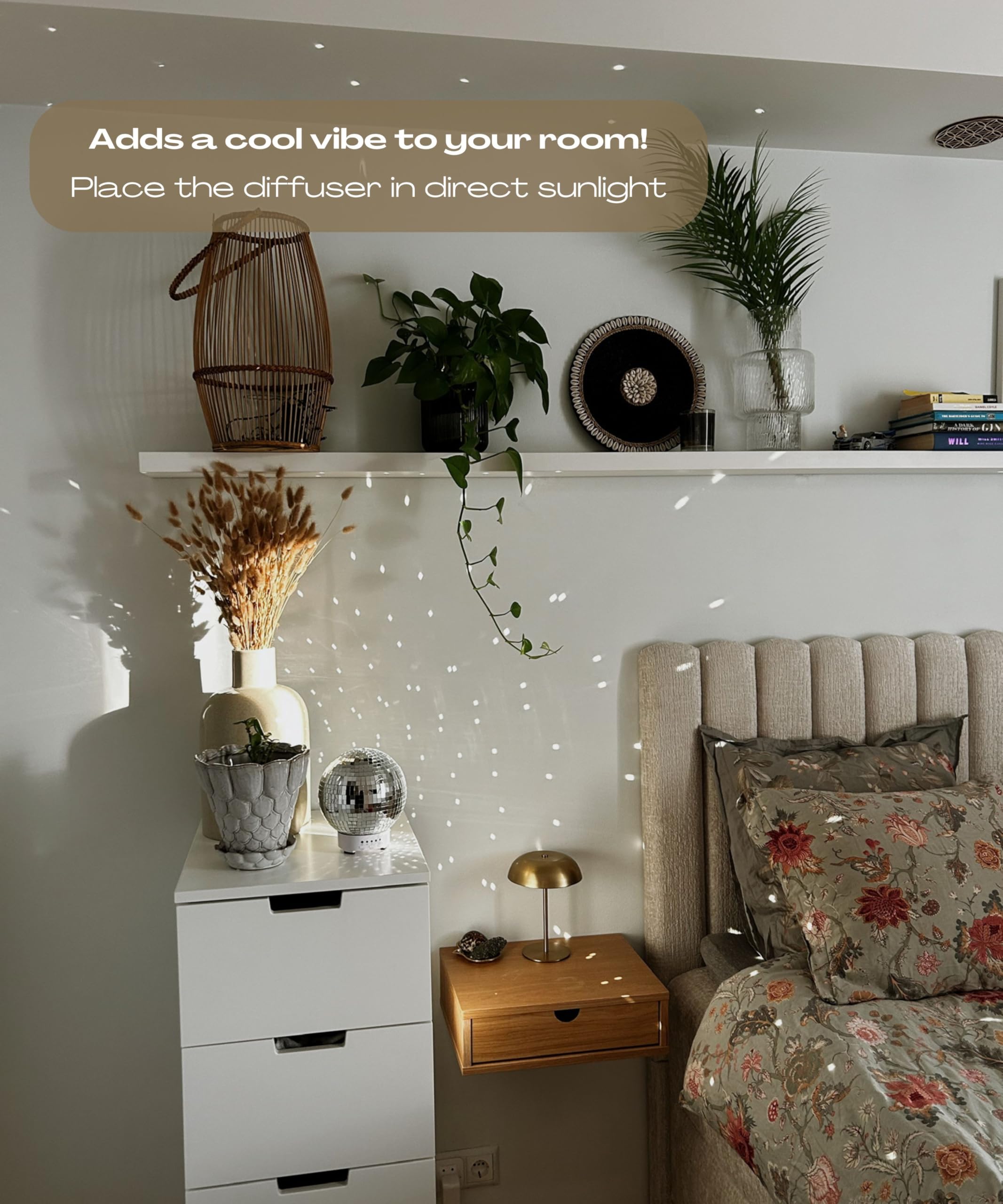SCANDINORDICA disco ball diffuser emits a gentle mist for ambient aromatherapy.