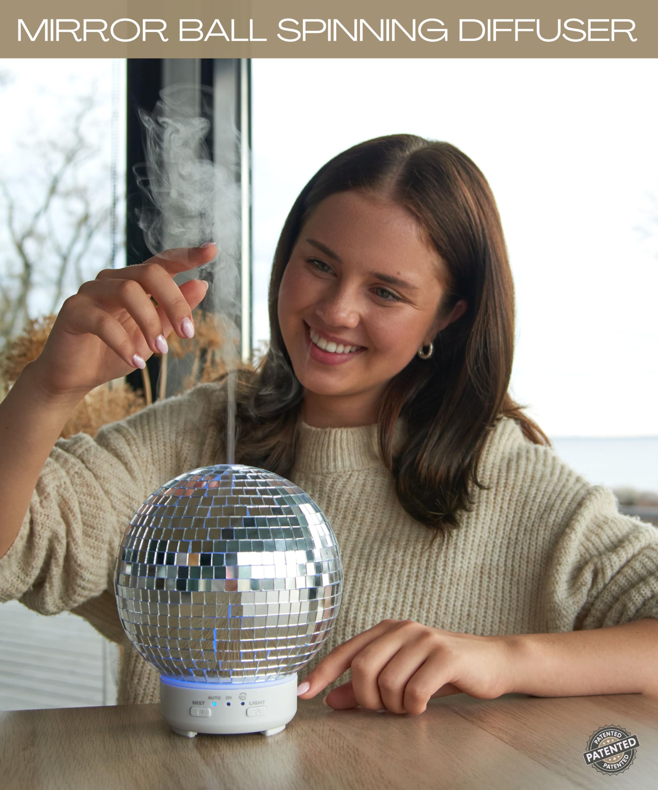 SCANDINORDICA Mirror Ball Diffuser creates party-ready atmosphere with reflective sparkle.