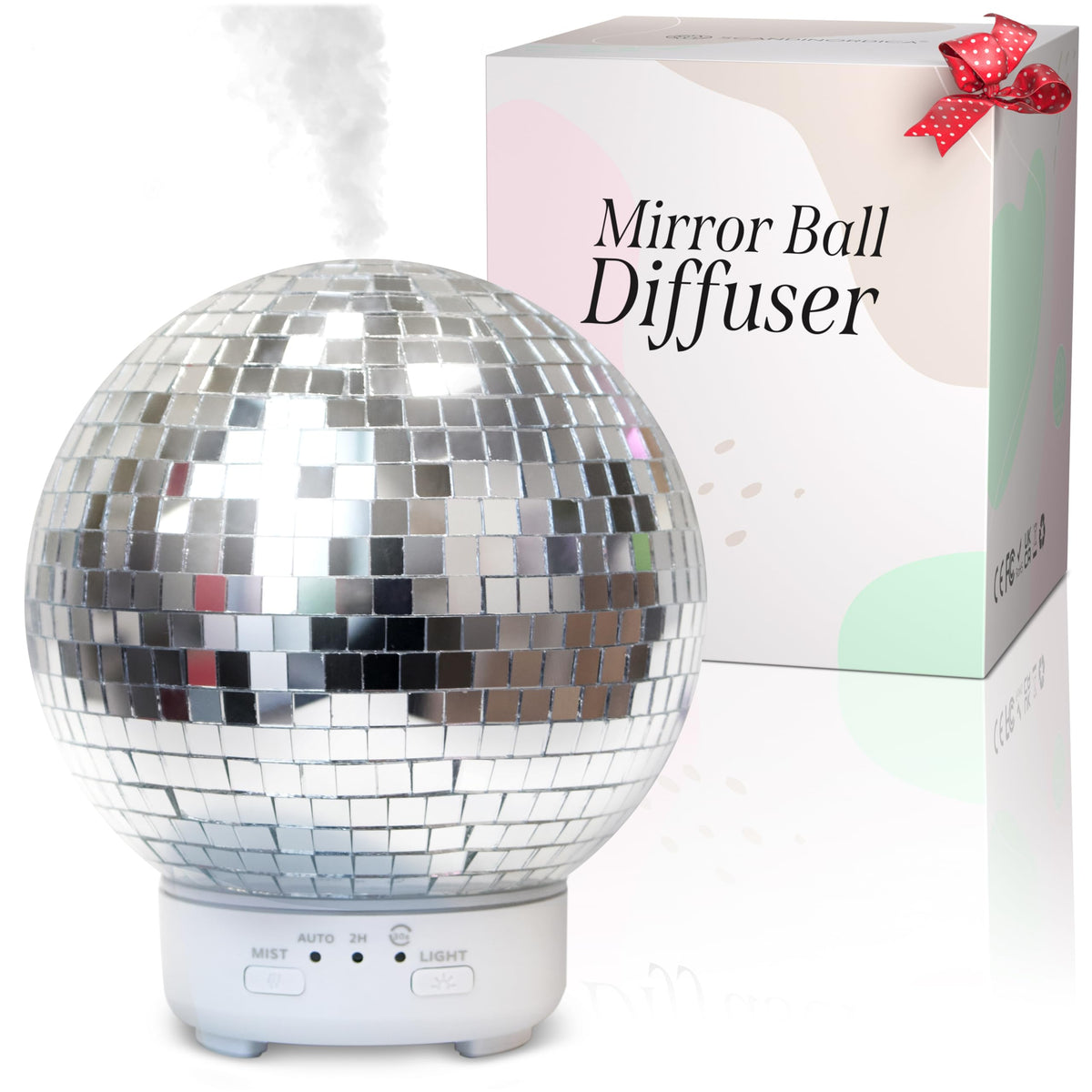 SCANDINORDICA Mirror Ball Diffuser in polished silver enhances living room ambiance.