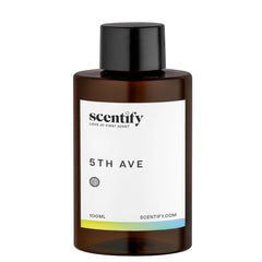 Scentify 5th Ave bottle pour close-up showing easy diffuser setup and calm mood.