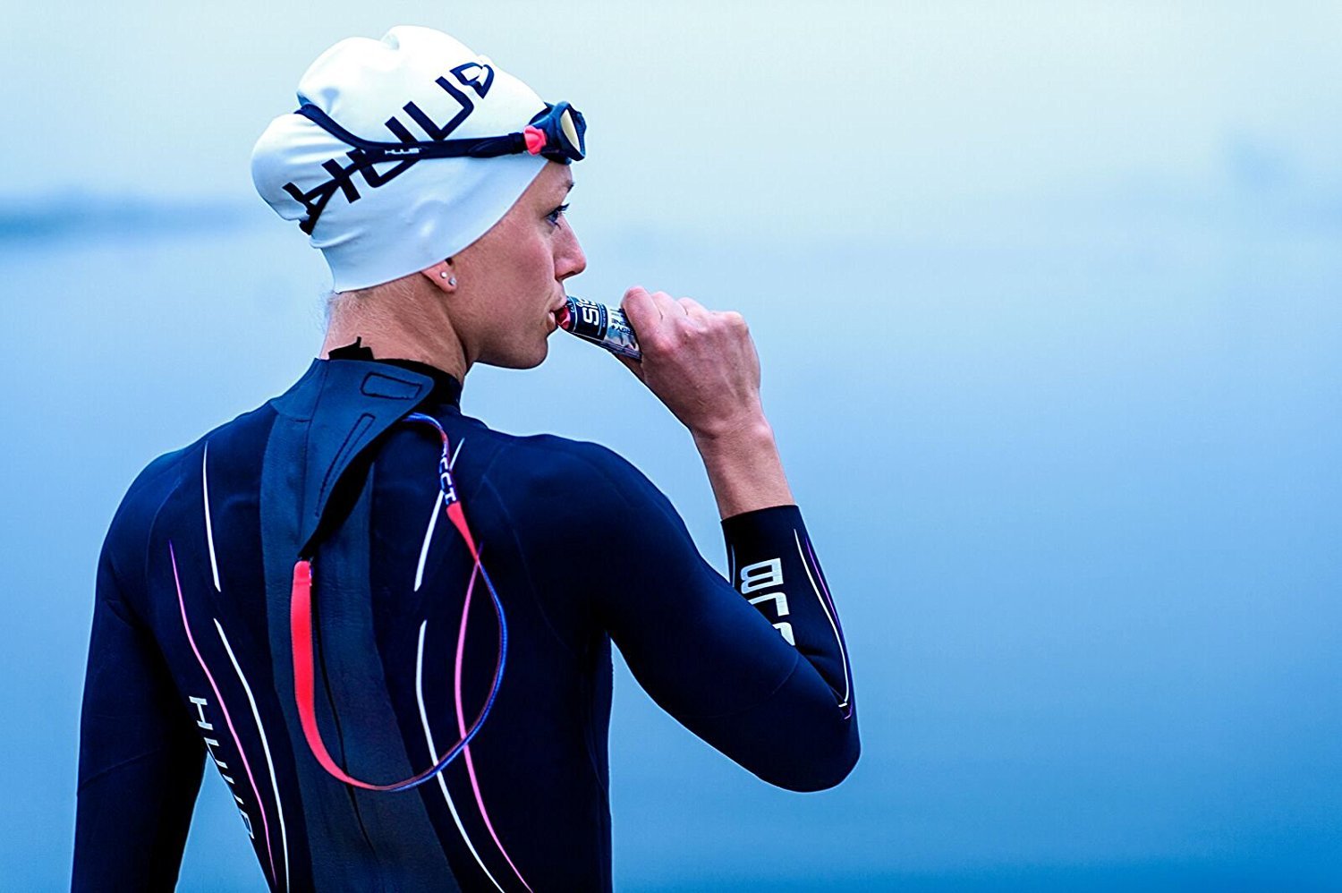 Science in Sport energy gel close-up, smooth texture for quick energy during workouts.