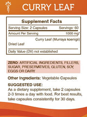 The Secrets of the Tribe curry leaf capsules bottle label shows purity and ingredients.