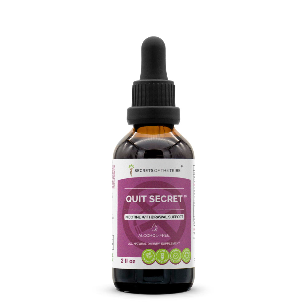 Secrets of the Tribe Quit Secret Alcohol-Free Extract bottle on a neutral backdrop.
