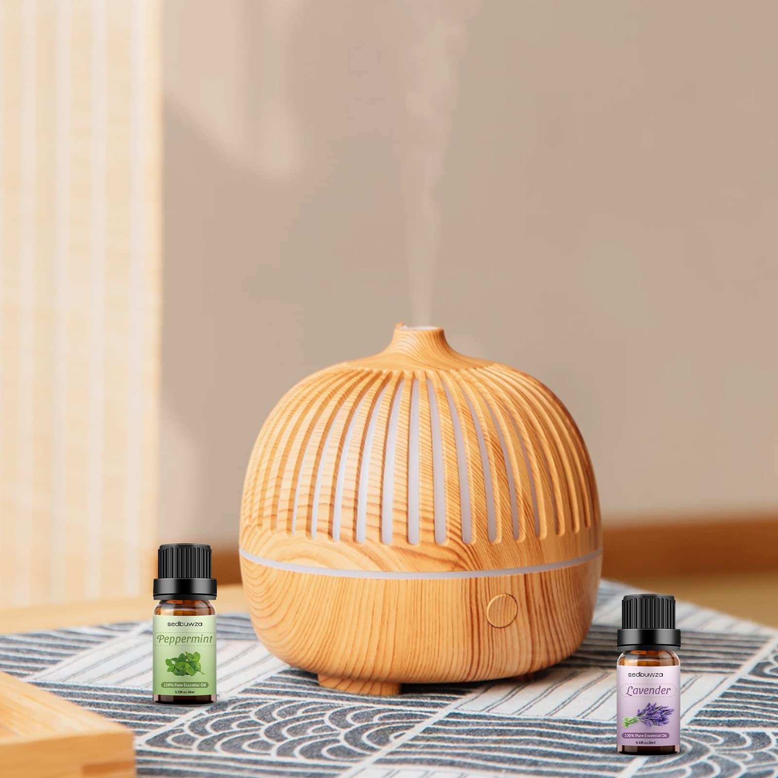 Sedbuwza diffuser-use setup shows easy room freshening with lavender peppermint oils.