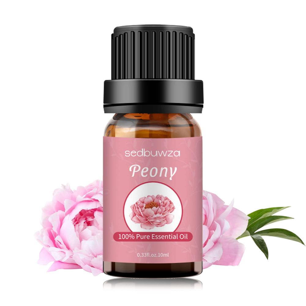 Sedbuwza Peony Oil near candles and soaps for DIY scent projects.