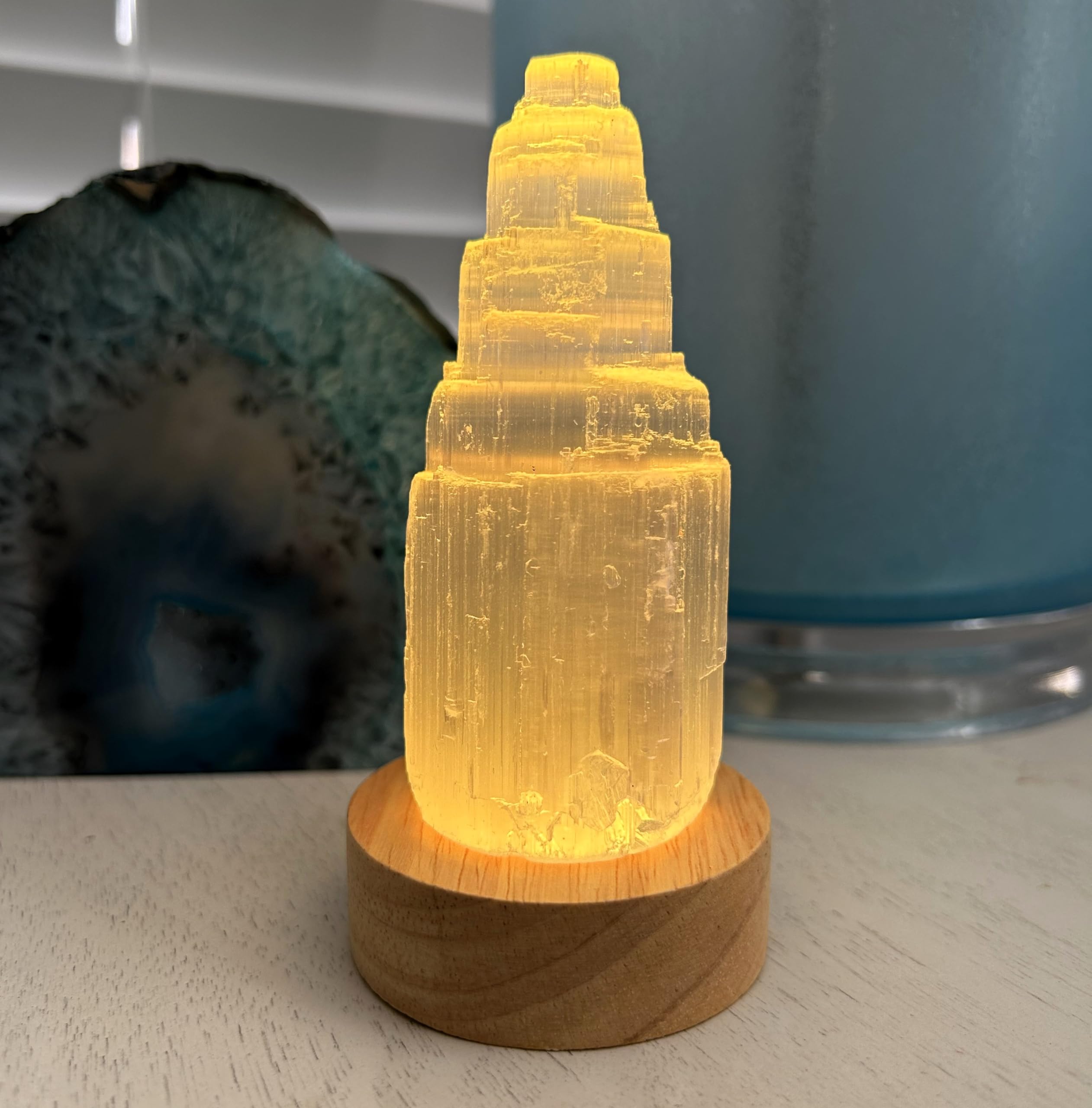 Keep jewelry near the Selenite Tower for continuous cleansing and display