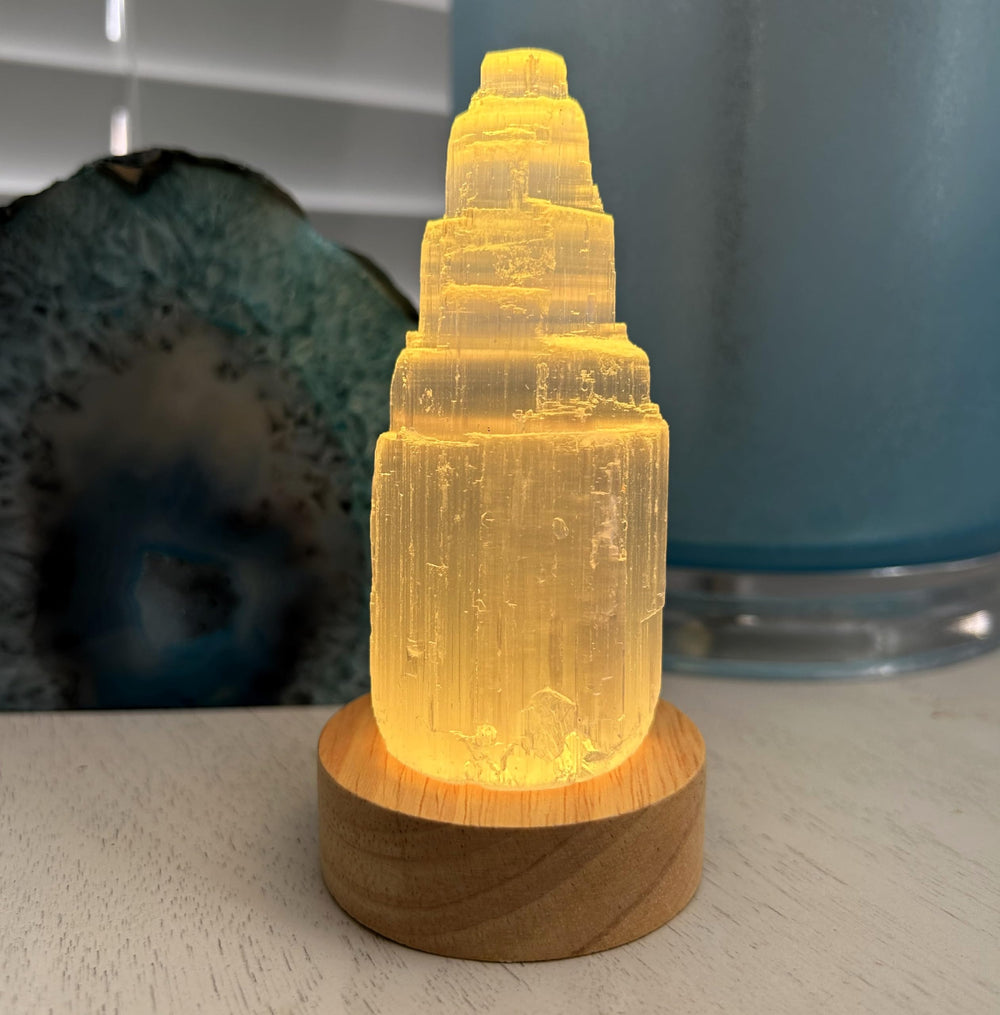 Keep jewelry near the Selenite Tower for continuous cleansing and display