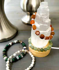 Small 4-inch Selenite Moroccan Tower side angle highlights energy clearing in homes or offices