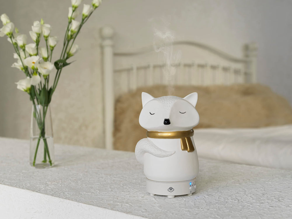 Snow Fox diffuser shown in a cozy room setting.
